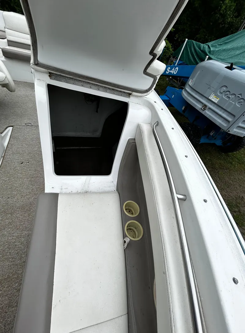 Slide: The Image of Open storage compartment on a 2001 Cobalt 226 boat. - 37