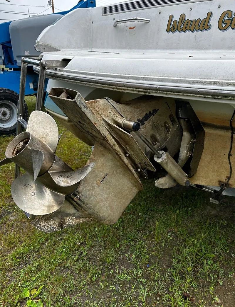 Slide: The Image of 2001 Cobalt 226 boat with visible propeller and stern drive. - 40