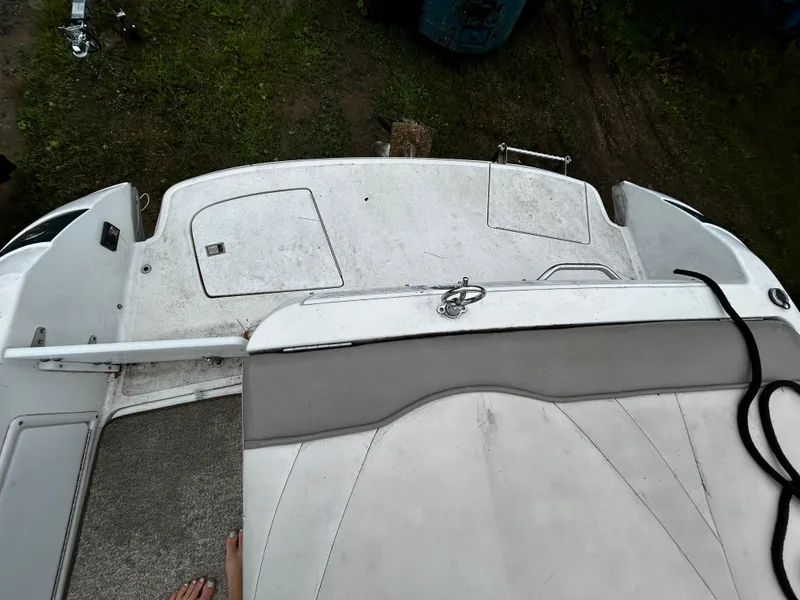 Slide: The Image of 2001 Cobalt 226 boat stern with swim platform and storage compartments. - 8