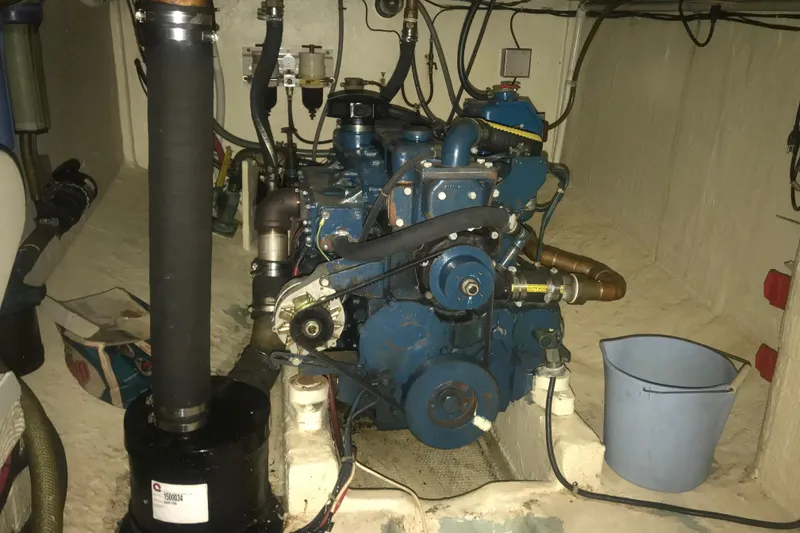 Slide: The Image of Engine room of 1984 Custom 43 Steady Sailor with visible machinery and equipment. - 24