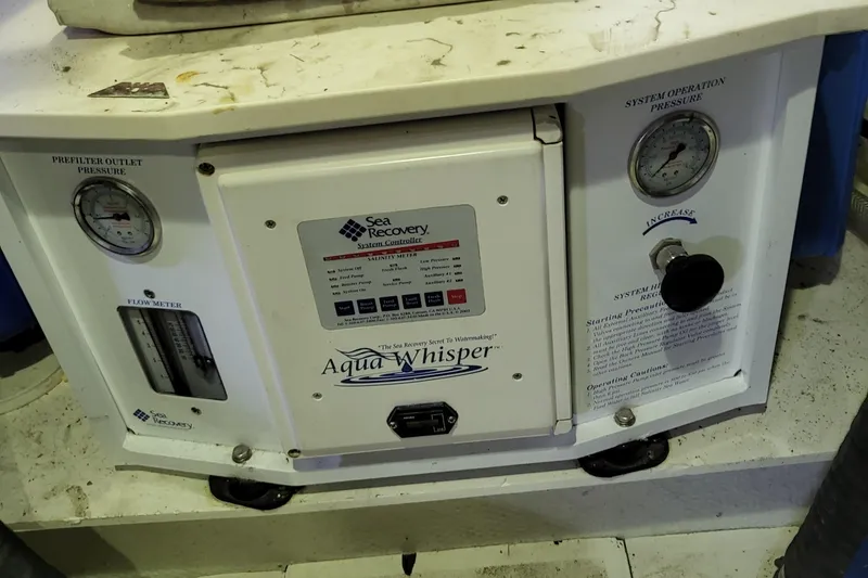 Slide: The Image of 1970 Chris-Craft Commander featuring Sea Recovery Aqua Whisper water system controls. - 25