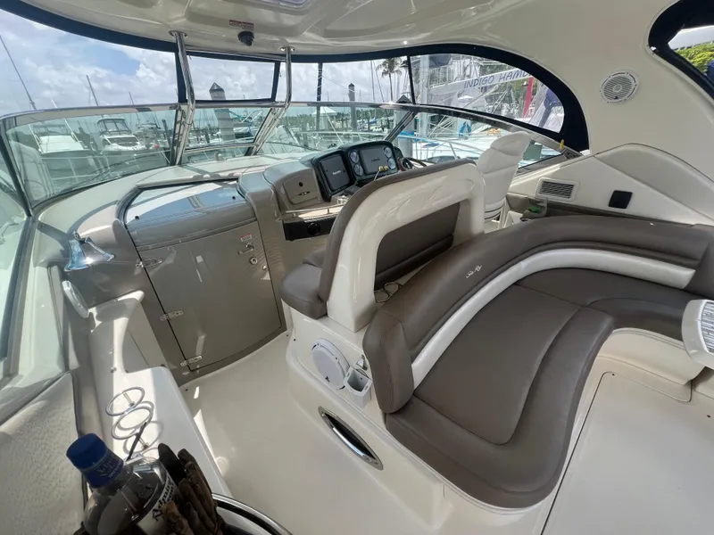 Slide: The Image of Interior of 2005 Sea Ray 420 Sundancer yacht with modern helm and seating. - 15
