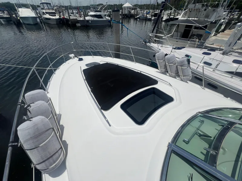 Slide: The Image of 2005 Sea Ray 420 Sundancer yacht docked at marina. - 22