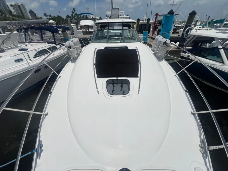 Slide: The Image of 2005 Sea Ray 420 Sundancer yacht docked at marina, top view. - 25