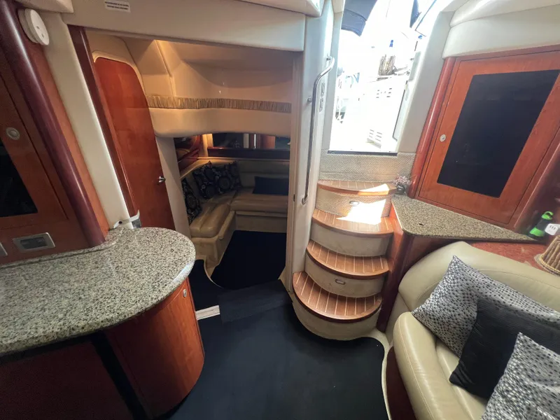 Slide: The Image of Luxurious interior of 2005 Sea Ray 420 Sundancer yacht with elegant wood and leather finishes. - 28