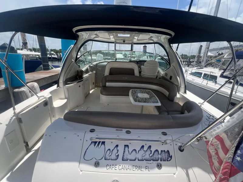 Slide: The Image of 2005 Sea Ray 420 Sundancer yacht with spacious seating, docked at Cape Canaveral marina. - 8