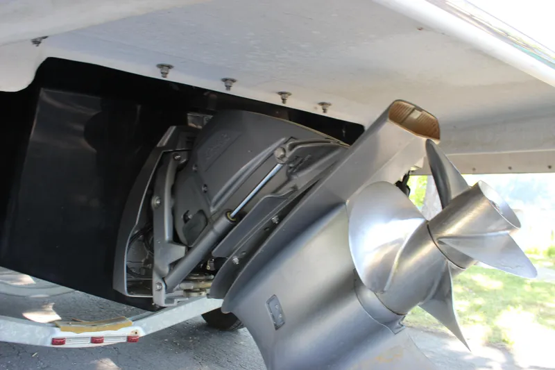 Slide: The Image of Close-up of the propeller and stern drive of a 2016 Regal 2500 Bowrider boat. - 32