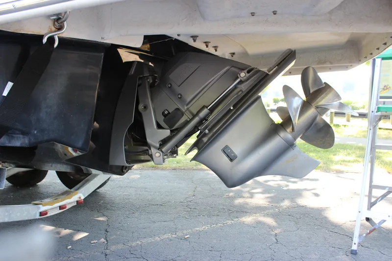 Slide: The Image of Close-up of the propeller and stern drive of a 2016 Regal 2500 Bowrider boat. - 35