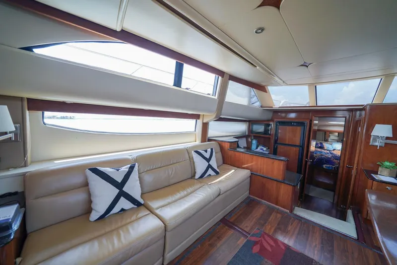 Slide: The Image of Interior of 2007 Meridian 459 Motor Yacht with leather seating and modern decor. - 4