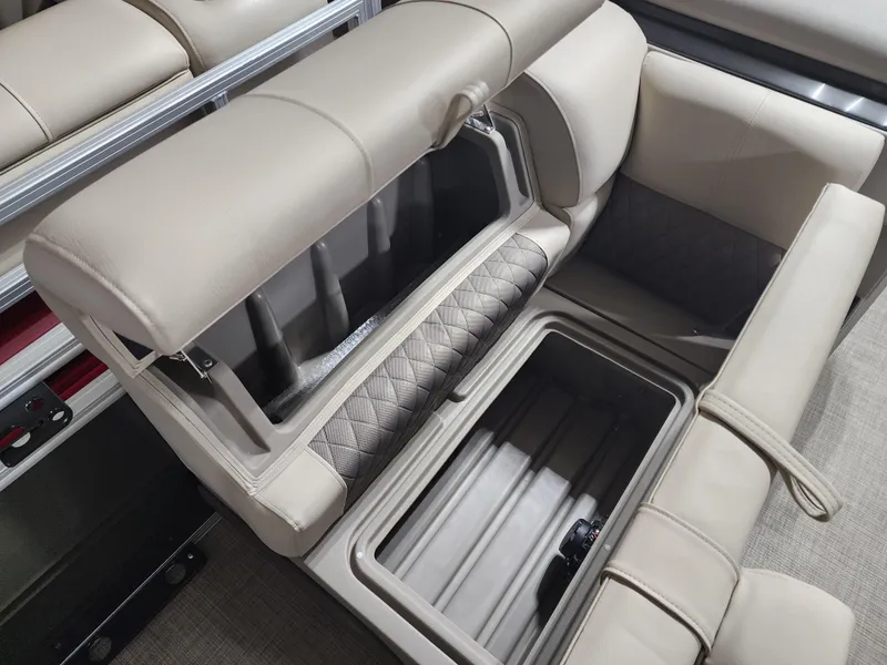 Slide: The Image of 2024 Sun Tracker Fishin' Barge 20 DLX interior storage compartments. - 7