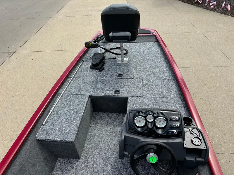 Slide: The Image of 2024 Tracker Pro 170 boat interior with steering console and seating. - 4