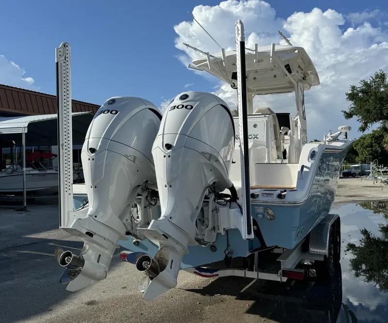 Slide: The Image of 2022 Sea Fox 288 Commander boat with twin 300 horsepower engines on trailer. - 3