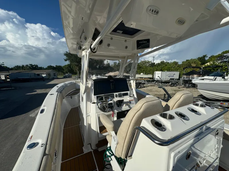Slide: The Image of 2022 Sea Fox 288 Commander boat interior with helm and seating. - 4
