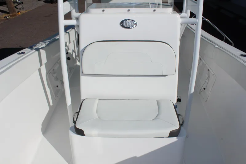 Slide: The Image of Clearwater 2300 WI 2024 model boat interior seating area. - 13