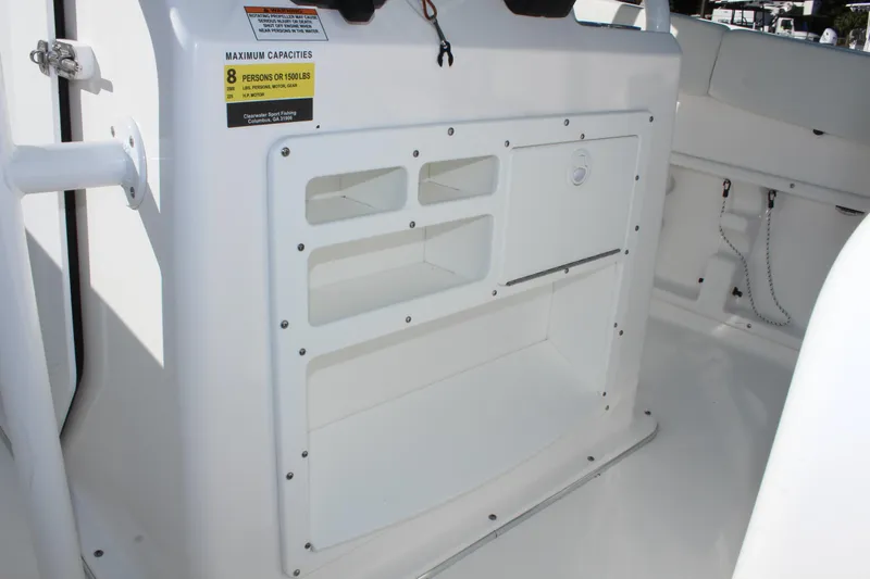Slide: The Image of 2024 Clearwater 2300 WI boat interior storage compartments. - 20