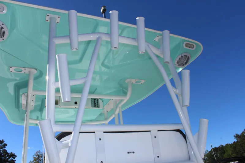 Slide: The Image of 2024 Clearwater 2300 WI boat with rod holders and speakers. - 28