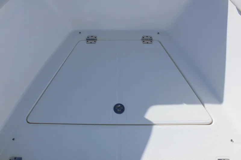 Slide: The Image of 2024 Clearwater 2300 WI boat storage compartment. - 9