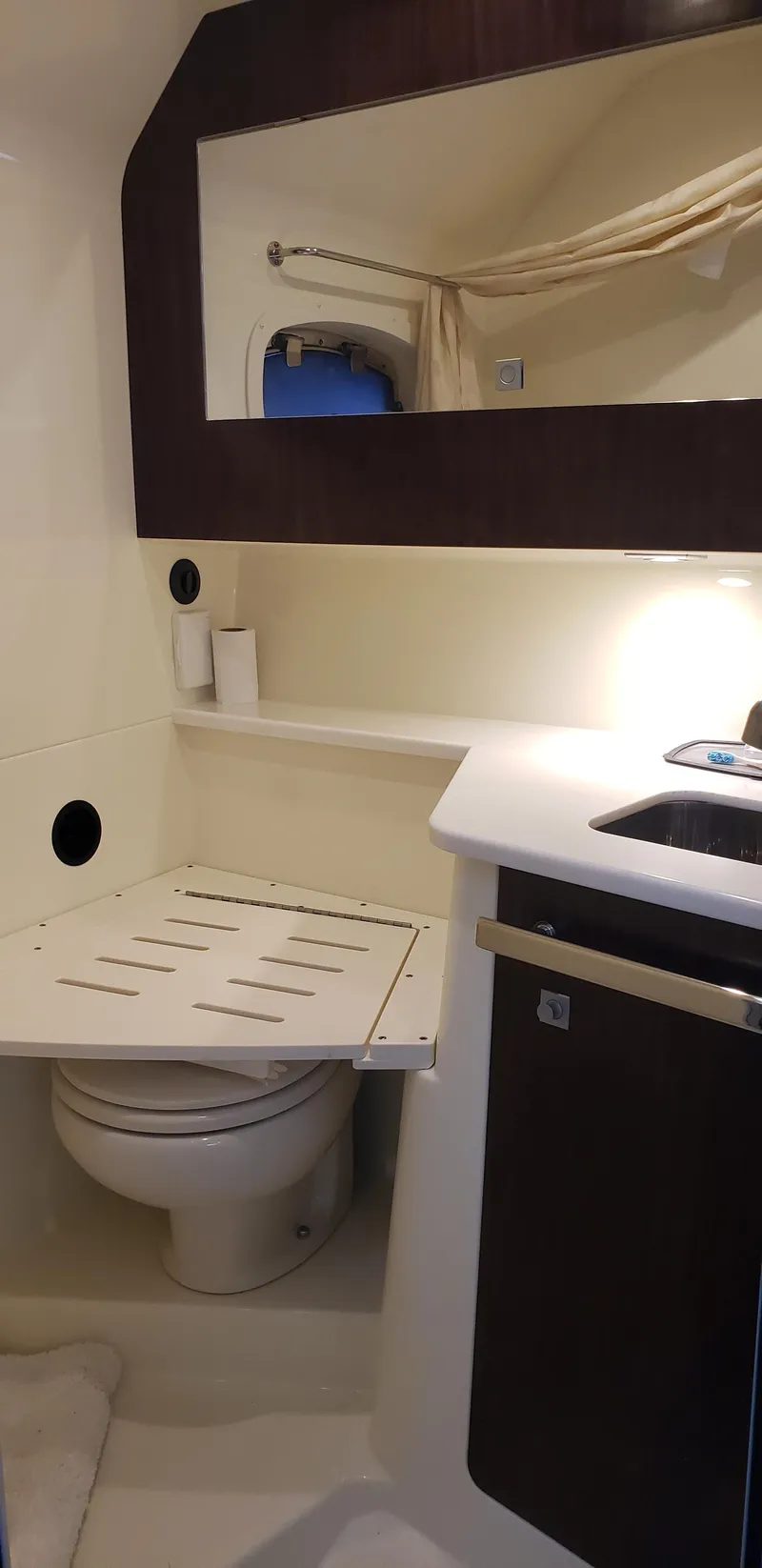 Slide: The Image of 2016 Monterey 360 Sport Coupe bathroom with modern fixtures and mirror. - 28