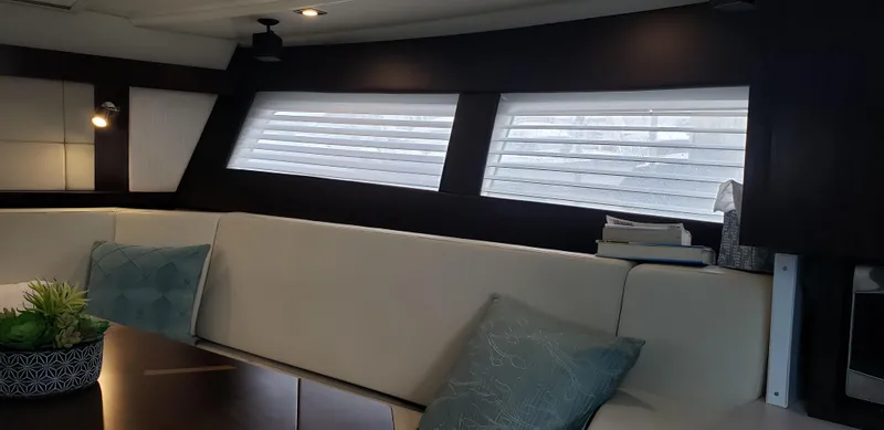 Slide: The Image of Interior of 2016 Monterey 360 Sport Coupe with modern seating and decor. - 29