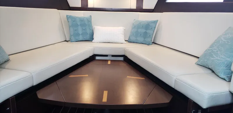 Slide: The Image of Luxurious seating area in 2016 Monterey 360 Sport Coupe yacht interior. - 30