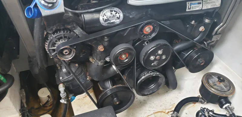 Slide: The Image of Engine compartment of a 2016 Monterey 360 Sport Coupe with visible belts and pulleys. - 37