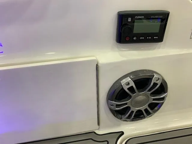 Slide: The Image of 2024 Sea Ray SDX 250 boat audio system with Fusion stereo and speaker. - 11