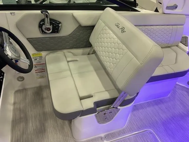 Slide: The Image of 2024 Sea Ray SDX 250 boat interior with luxurious seating and modern controls. - 3