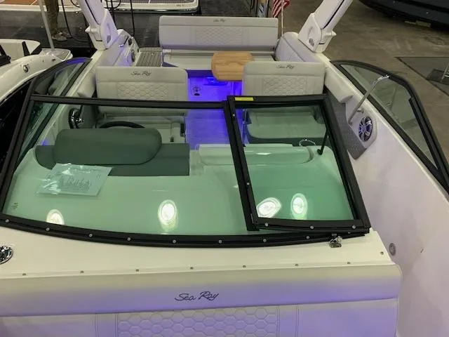 Slide: The Image of 2024 Sea Ray SDX 250 boat interior with seating and windshield. - 5