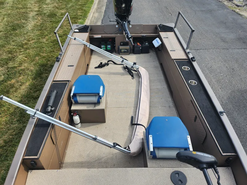 Slide: The Image of 2015 Smoker Craft Sportsman Pro 1866 fishing boat interior with equipment. - 17