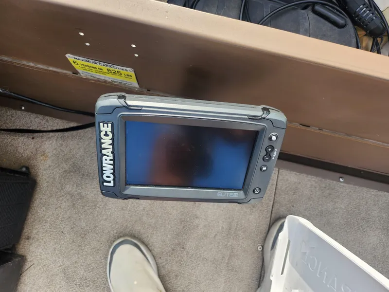 Slide: The Image of Lowrance fish finder on 2015 Smoker Craft Sportsman Pro 1866 boat. - 20