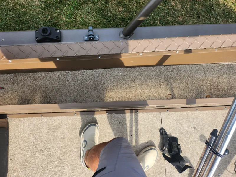 Slide: The Image of 2015 Smoker Craft Sportsman Pro 1866 boat deck with fishing rod holder. - 22