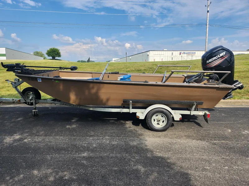 Slide: The Image of 2015 Smoker Craft Sportsman Pro 1866 boat on trailer with Mercury outboard motor. - 4
