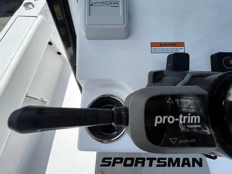 Slide: The Image of 2024 Sportsman Masters 247 Bay Boat console with pro-trim control. - 17