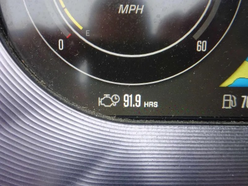 Slide: The Image of Close-up of 2022 MasterCraft XT23 engine hours display showing 91.9 hours. - 15