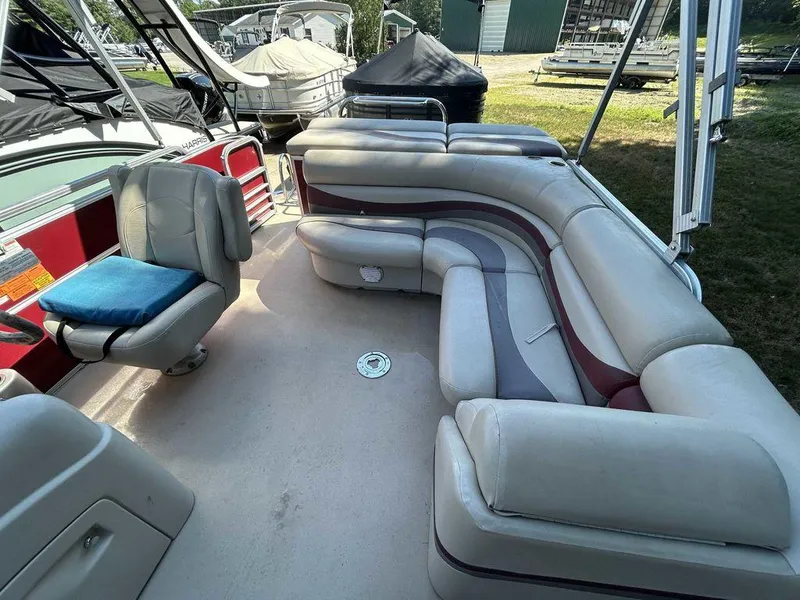 Slide: The Image of 2012 South Bay 518 CR pontoon boat interior with seating and helm. - 14