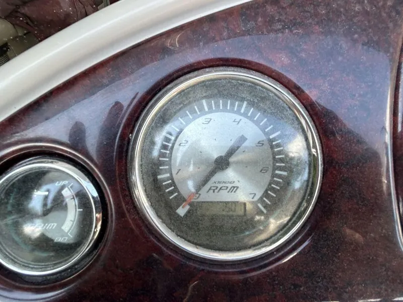 Slide: The Image of Close-up of 2012 South Bay 518 CR boat tachometer and fuel gauge. - 5