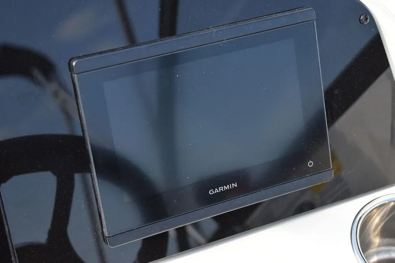Slide: The Image of Garmin display on 2024 Stingray 201DC boat dashboard. - 30