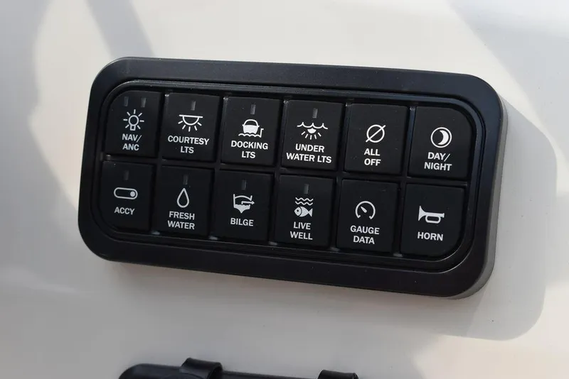 Slide: The Image of 2024 Stingray 201DC control panel with various function buttons. - 46