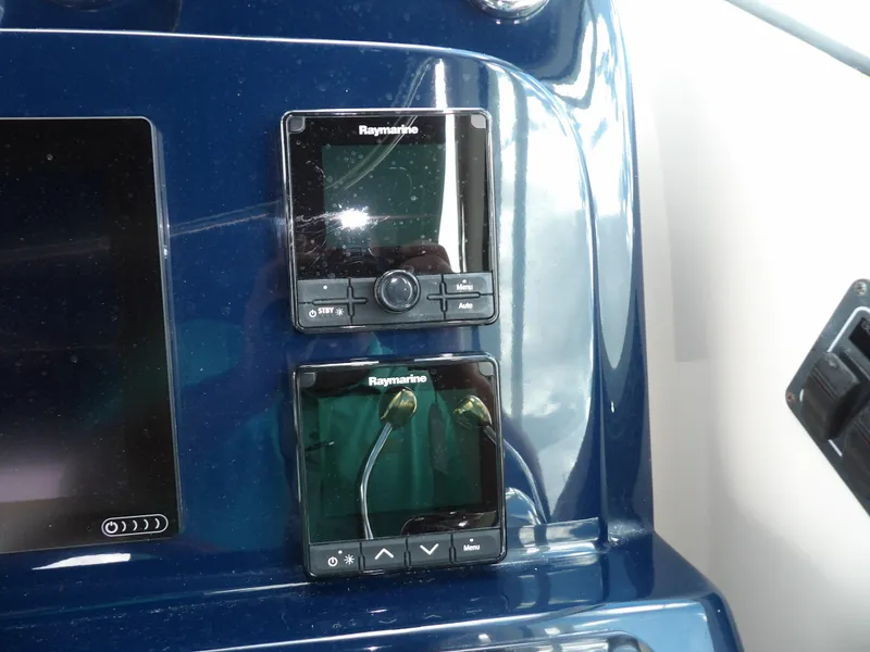 Slide: The Image of Raymarine electronics on the dashboard of a 2012 Tiara Yachts 3100 Coronet. - 28