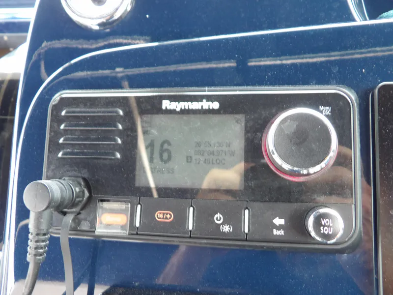Slide: The Image of Raymarine marine radio on 2012 Tiara Yachts 3100 Coronet dashboard. - 36