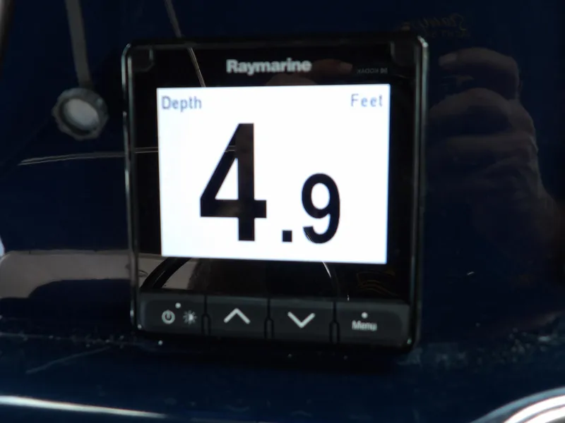 Slide: The Image of Raymarine depth gauge showing 4.9 feet on a 2012 Tiara Yachts 3100 Coronet. - 37