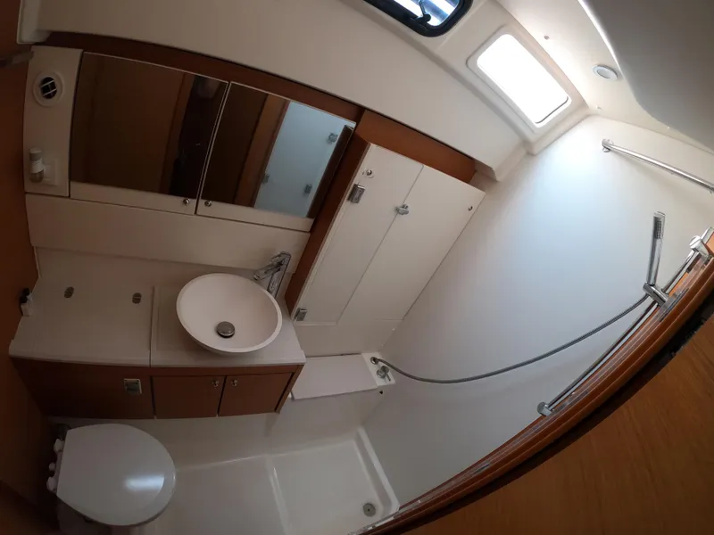 Slide: The Image of 2017 Jeanneau 54 yacht bathroom with modern fixtures and ample lighting. - 47