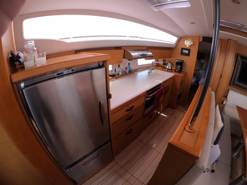Slide: The Image of Modern kitchen interior of 2017 Jeanneau 54 yacht with stainless steel appliances. - 49