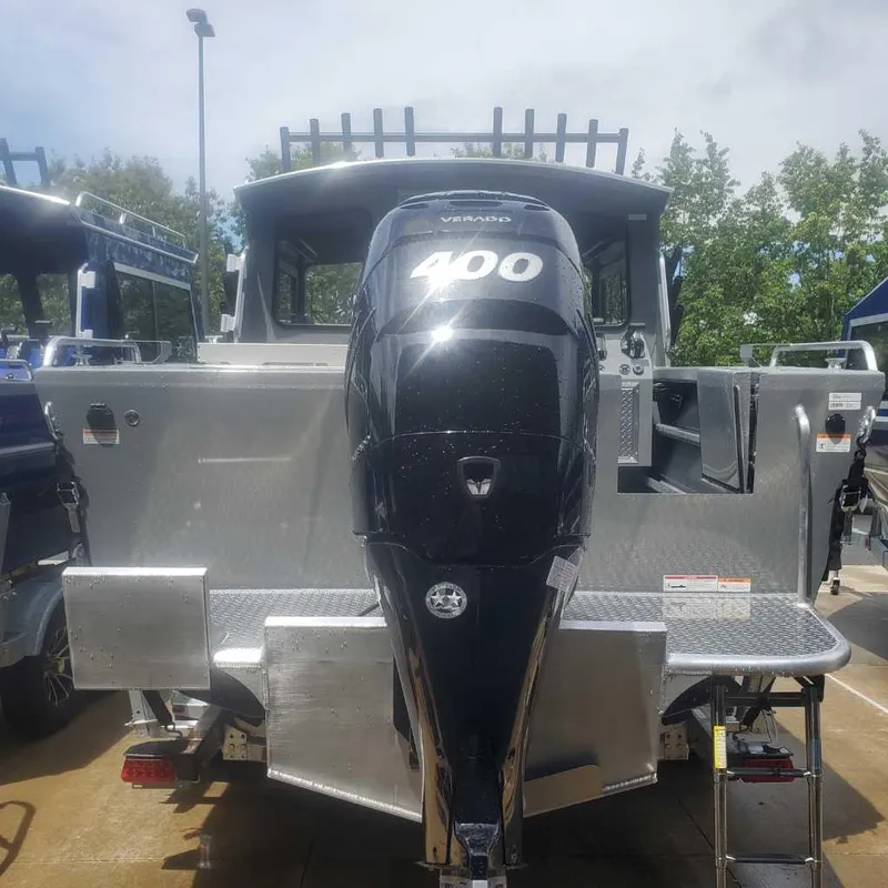 Slide: The Image of 2024 Spartan Maximus 240 boat with a powerful 400 horsepower outboard motor. - 9