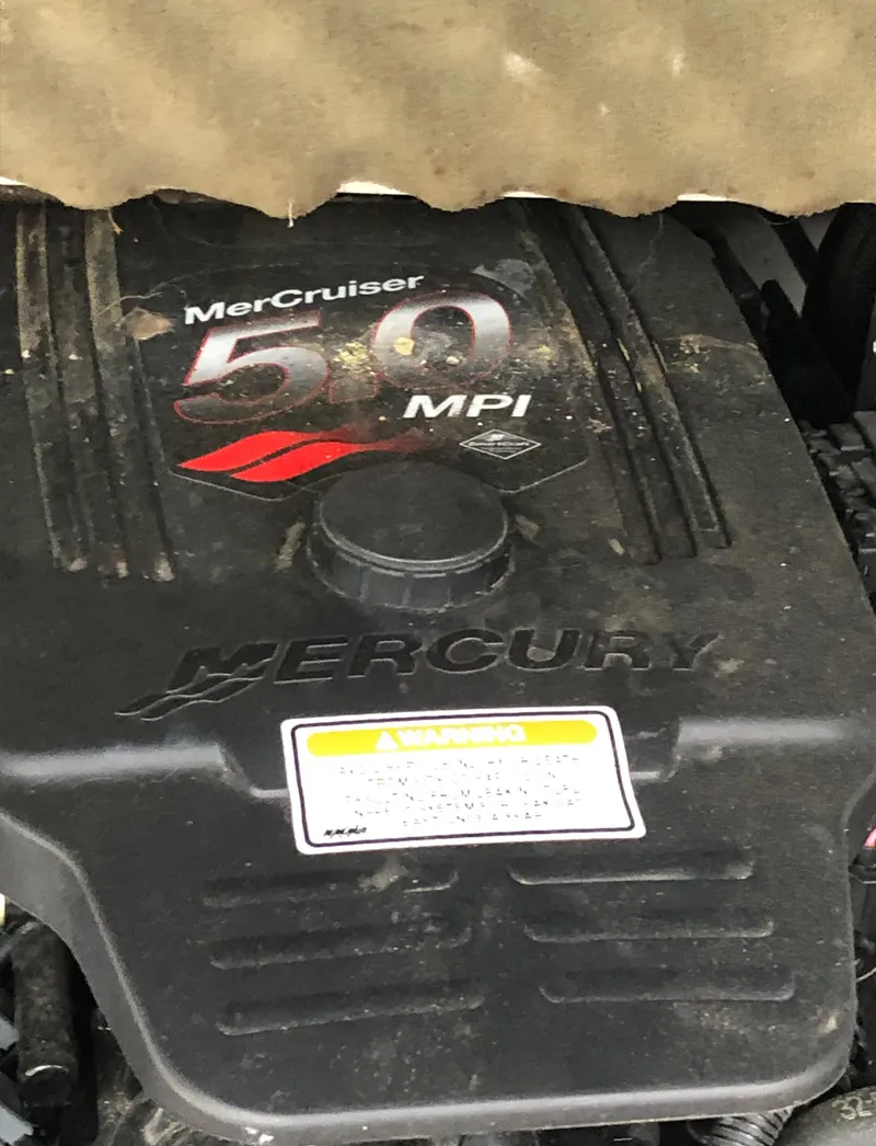 Slide: The Image of 2007 Crownline 240 EX boat engine, MerCruiser 5.0 MPI, Mercury branding visible. - 17