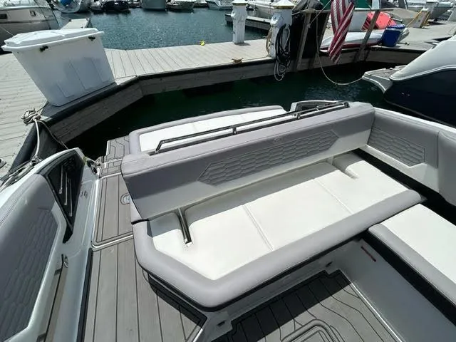 Slide: The Image of 2022 Cobalt A29 boat interior at marina dock. - 13