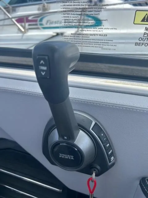Slide: The Image of Throttle control lever on a 2022 Cobalt A29 boat. - 17