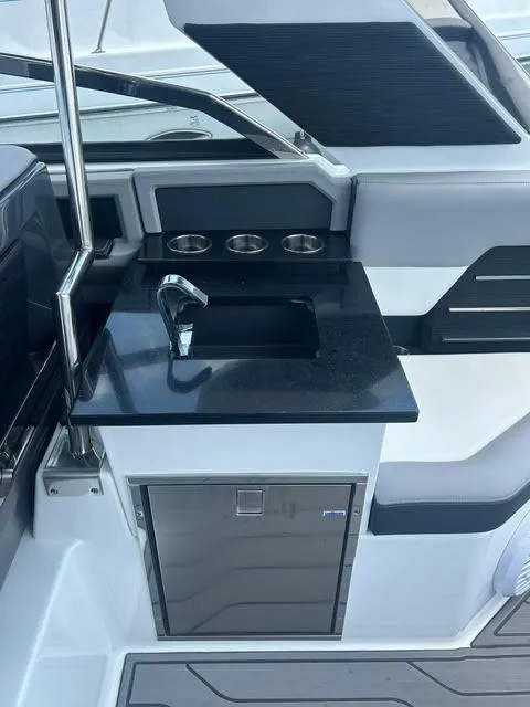 Slide: The Image of 2022 Cobalt A29 boat interior with sink and countertop. - 21