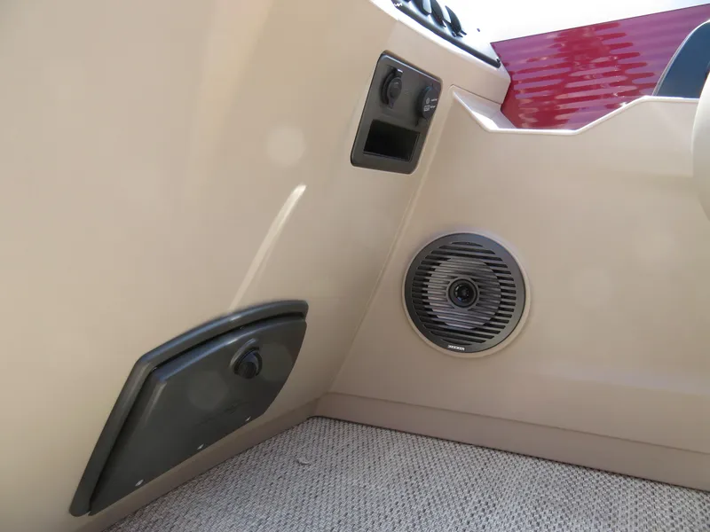Slide: The Image of Interior detail of 2024 Bennington 22SSR boat showing speaker and control panel. - 11