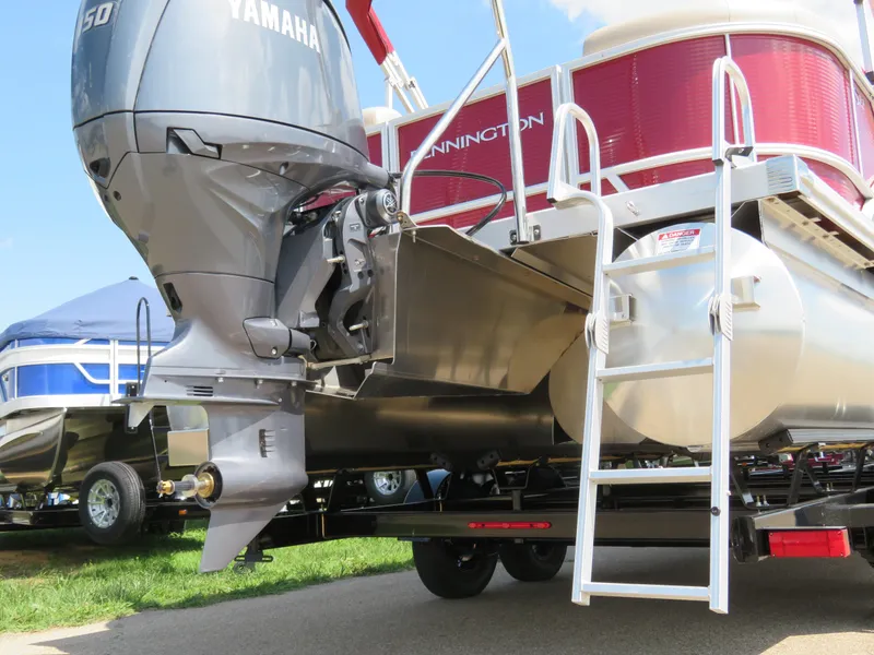 Slide: The Image of 2024 Bennington 22SSR pontoon boat with Yamaha outboard motor. - 5